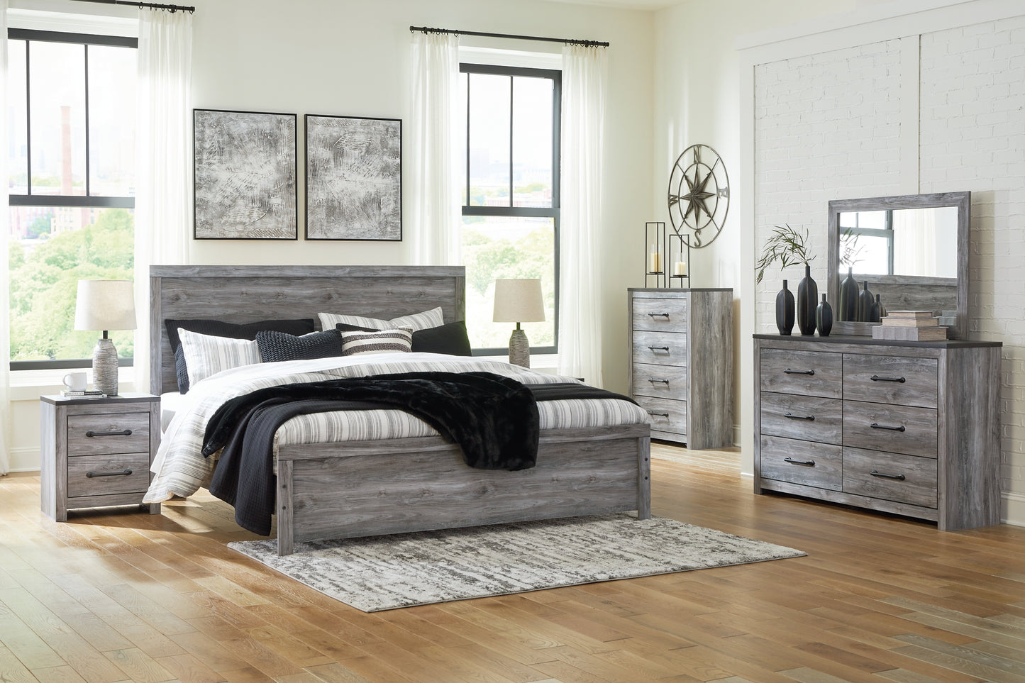 Bronyan King Panel Bed with Mirrored Dresser and Nightstand