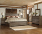 Juararo Queen Panel Bed with Mirrored Dresser and Chest